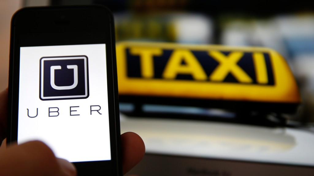  Many Canadian cities are trying to stop Uber from operating by filing court injunctions against the ride-sharing company. (Kai Pfaffenbach/Reuters) 