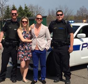She said yes! Supplied photo (From left) Peel Regional Police Const. Kevin Mitchell, Sara Silva, Michael Di Mascio and Const. Michael Kremer are all smiles after a staged traffic stop turned into a successful wedding proposal.
