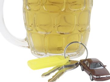 car keys in front of beer glass