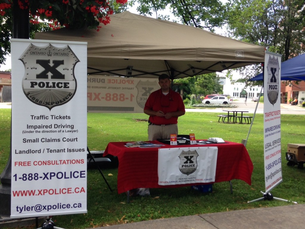XPolice's Tyler Benny, Licensed Paralegal, at the Taste of Durham Food Festival on August 14-16.