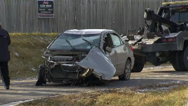 the damaged vehicle involved in the fatal police chase crash