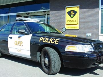 OPP cruiser by a police station