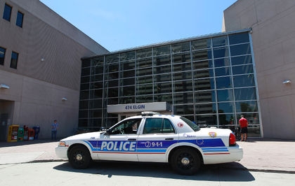 Police cruiser in front of the Ottawa police station.