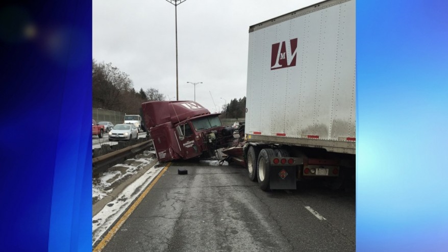 The remnants of the tractor trailer involved in the multi-vehicle collision is pictured.
