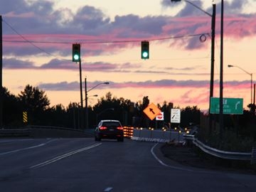 Intersection of Highway 118 and Highway 11 at dusk.
