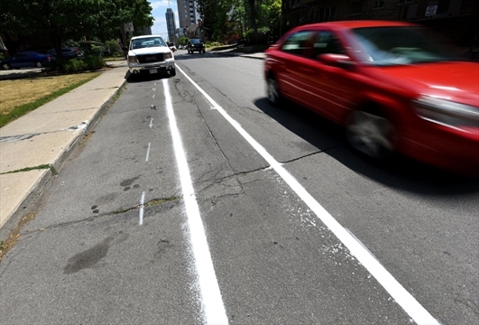 Barry Gray, The Hamilton Spectator New bike lanes are being painted on Charlton Avenue West from James Street South heading west.